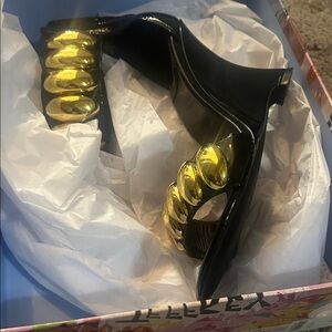 Jeffrey Campbell Black and Gold Heels. Slightly loved.